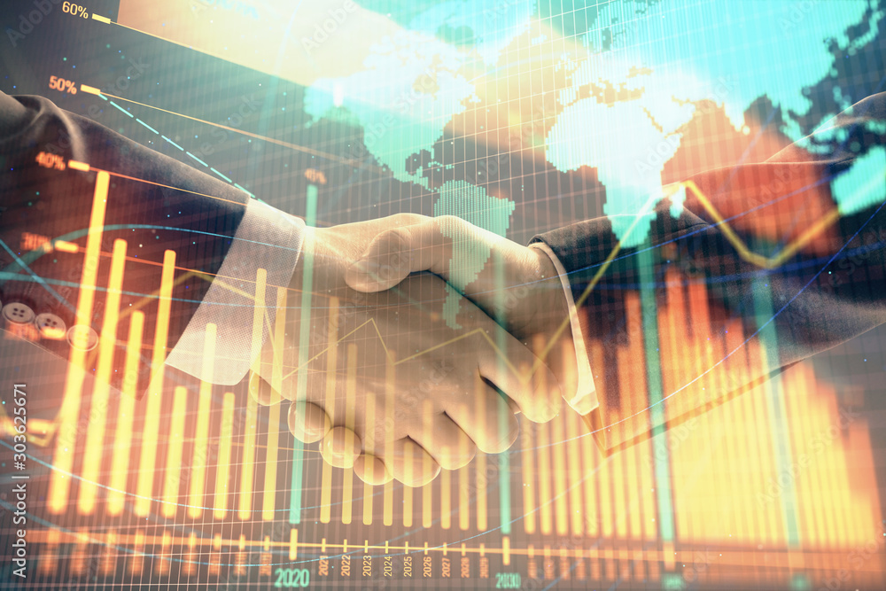 Poster multi exposure of forex graph and world map on abstract background with two businessmen handshake. c