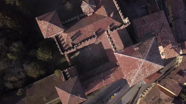 4k aerial drone tilt down footage over the Cereseto Castle, on the hills of Monferrato region, Alessandria province, Italy.