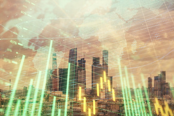 Double exposure of financial graph and world map on city veiw background. Concept of financial market research and analysis