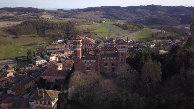 4k aerial drone forward footage to the Cereseto Castle, on the hills of Monferrato region, Alessandria province, Italy.