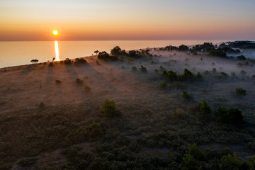 Stone wall on the Baltic sea in the summer. Osmussaar coast, island in Estonia, Europe.