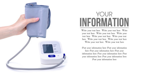 Digital blood pressure monitor electric tonometer in hand on white background isolation, space for...