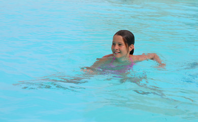 little girl during swimming lesson