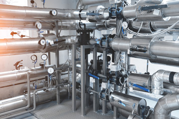 pipe lines for heat supply with pressure gauges, manometers, thermocouples installed in the boiler...