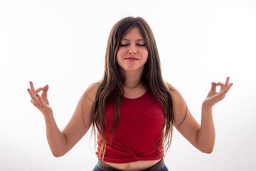 Young caucasian woman with yoga posture over isolated white background
