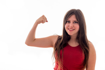 Caucasian young girl with glasses with gym weights and smiling on white background isolated