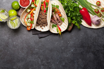 Mexican tacos and caipirinha cocktail