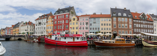 Fototapeta na wymiar Nyhavn, Happiness to be home again, Copenhagen, Denmark, Europe