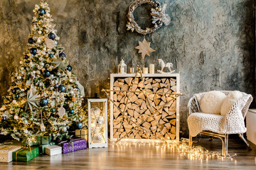 Christmas, New Year design interior of beautiful living room. Living room is decorated New Year fir tree, toys, gifts. Traditional winter holidays Christmas / New Year. 