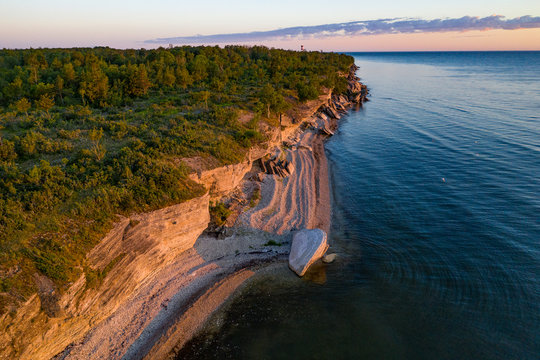 Stone wall on the Baltic sea in the summer. Pakri coast, island in Estonia, Europe.
