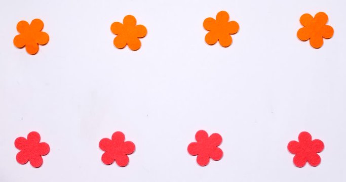 The green letter P flies from side to side. Top and bottom flowers are moving