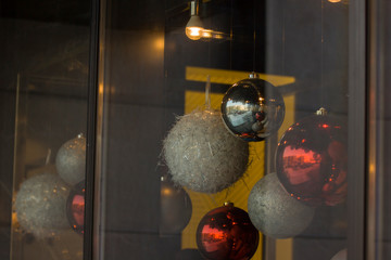 The decoration of the streets and storefronts of new year and Christmas toys balls, lanterns.