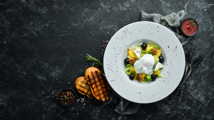 Salad with vegetables, blue cheese, olives and nuts. Vegetable salad. Top view. Free copy space.