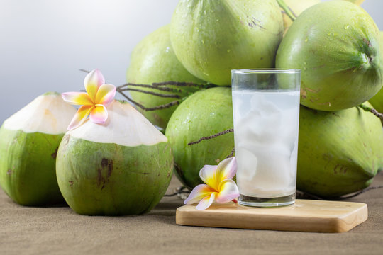 Fresh Organic Coconut Water with coconuts.Drink coconut water. Healthy food concept.