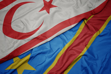 waving colorful flag of democratic republic of the congo and national flag of northern cyprus.