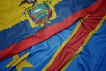 waving colorful flag of democratic republic of the congo and national flag of ecuador.