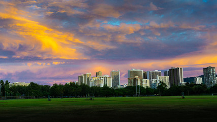 Honolulu Kapiolani Park sunrise vistas purples, magentas, orange and blue colorful city scape and landscape image