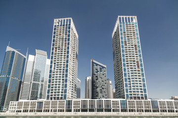 Fototapeta premium Office and residential skyscrapers in business district Dubai.