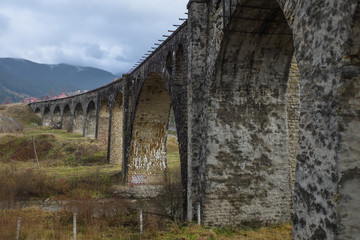 Fototapeta na wymiar old railway bridge over the river