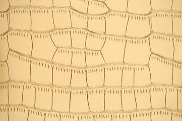 Light brown faux leather texture with large pattern.