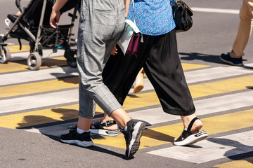 pedestrians crossing the street