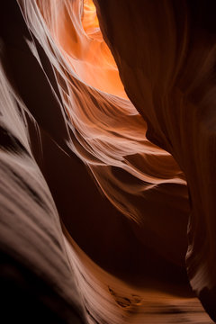 Different views of a slot canyon with red rocks