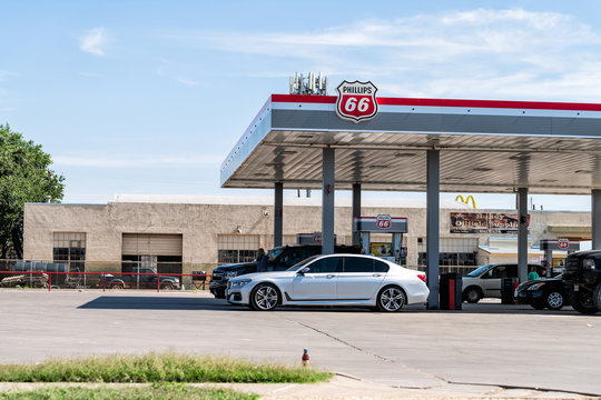 Post, USA - June 8, 2019: Phillips 66 has station on Highway road 84 in Texas countryside with building in summer