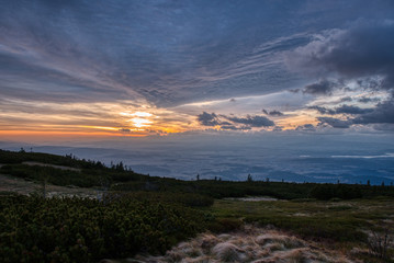 sunrise in mountains with many clouds, poland slovakia border, beskids babia gora