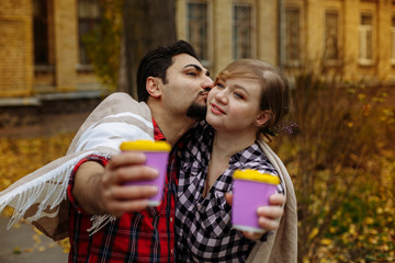 Fototapeta premium lovers smile and drink coffee