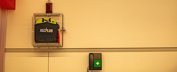 First aid shield in airport. Heart trigger