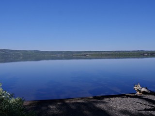 Cropped view of Lake Yellowstone on a cloudless day. Yellowstone National Park, Wyoming, USA.