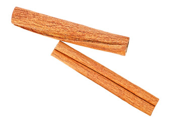 Two cinnamon sticks isolated on a white background, top view.