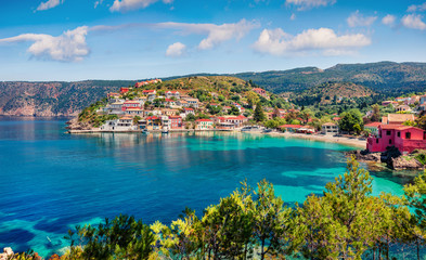 Impressive morning cityscape of Asos village on the west coast of the island of Cephalonia, Greece, Europe. Colorful summer sescape of Ionian Sea. Traveling concept background.