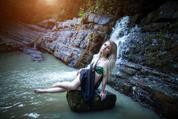 Girl in mountain river