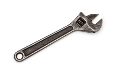 Swedish adjustable wrench. half closed, half open. old wrench on isolated white background. plumbing repair, concept.