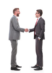 in full growth. two business men shaking hands.