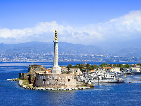MESSINA, SICILY, ITALY - MAY 05, 2011: View of the Messina's port with the gold Madonna della Lettera statue 