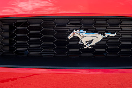 The sign and logo signature of the famous red Ford Mustang luxury sports car.