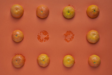 Fruit pattern of orange slices on orange background. Flat lay, top view. Food background