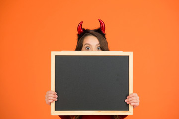 Creative work space. small girl school blackboard. little imp red horns. smiling kid info board....