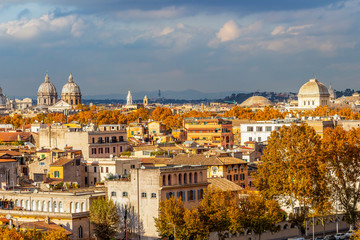 Fototapeta na wymiar Rome, Italy city view from the Orange Trees Garden or Savello Park under overcast November sky