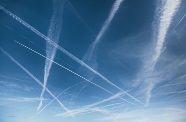 Chemtrails over the blue sky