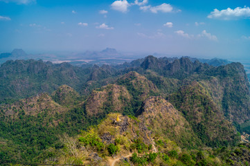 Fototapeta na wymiar view of mountains with golden pagoda