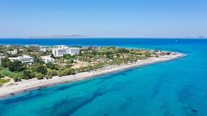 Panoramic aerial view of a Mediterranean island Kos in Greece Lambi coastline touristic area with crystal clear water on a sunny summer day - obrazy, fototapety, plakaty