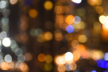Abstract blurred bokeh background with glittering night city lights