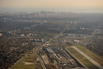 Downsview Airport and Yorkdale Shopping Centre in North York with Toronto city skyline of highrise towers