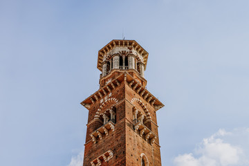 Obraz premium Torre dei lamberti, Lamberti tower, in Piazza delle Erbe, highest building in Verona, Italy