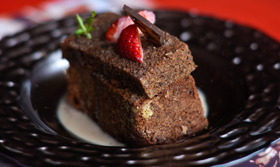 Chocolate cake with strawberry topping 