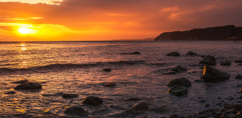Fototapeta na wymiar dawn on the shore of the Baltic Sea