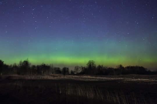 bright aurora in russia, outside the city